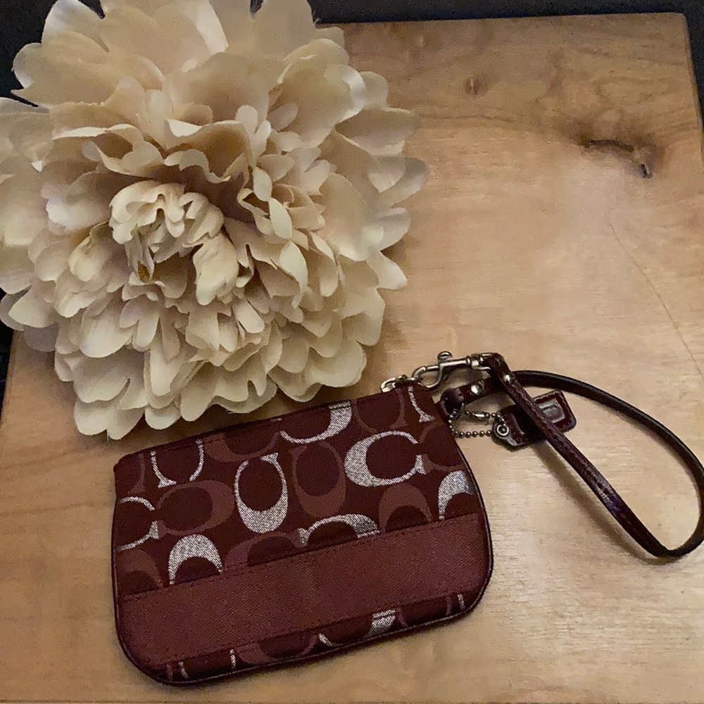 Coach burgundy and silver wristlet/wallet